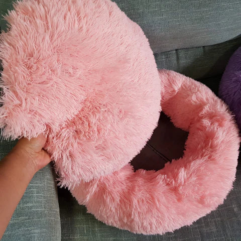 Textura del peluche vegano y costuras reforzadas de la cama antiestrés
