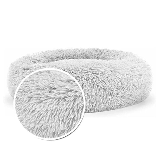 Detalle de cama antiestrés talla M con tela hipoalergénica, base antideslizante e interior acolchado.